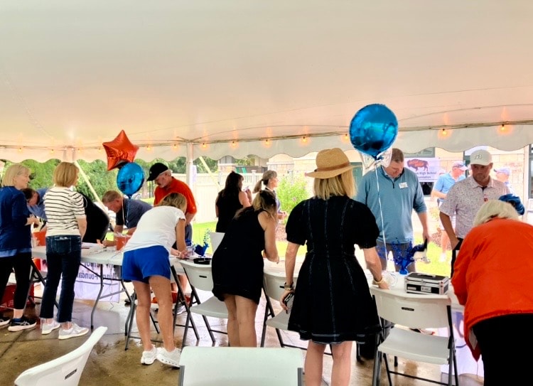 Outdoor tent party with balloons