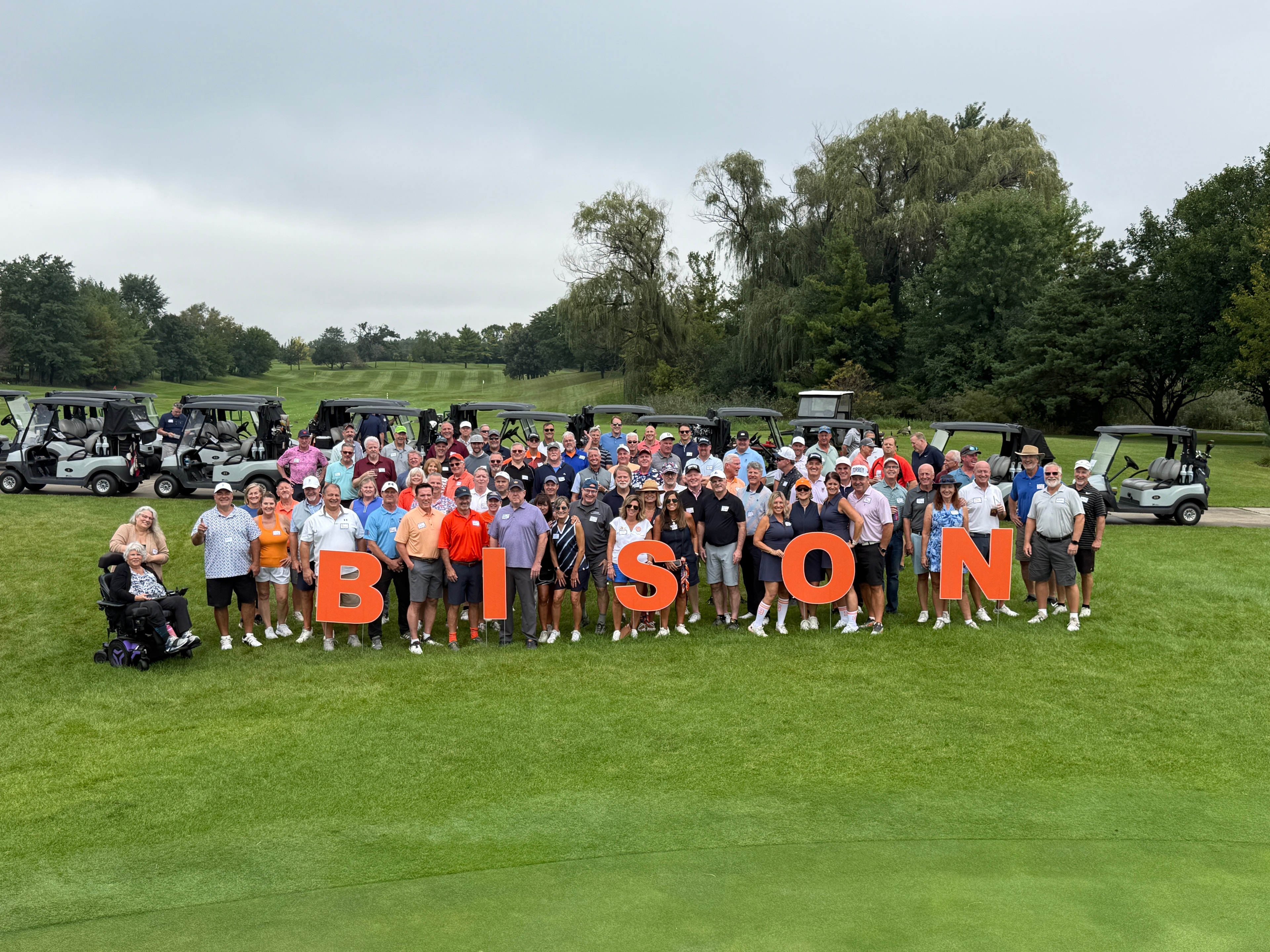Large group at golf tournament Bison event
