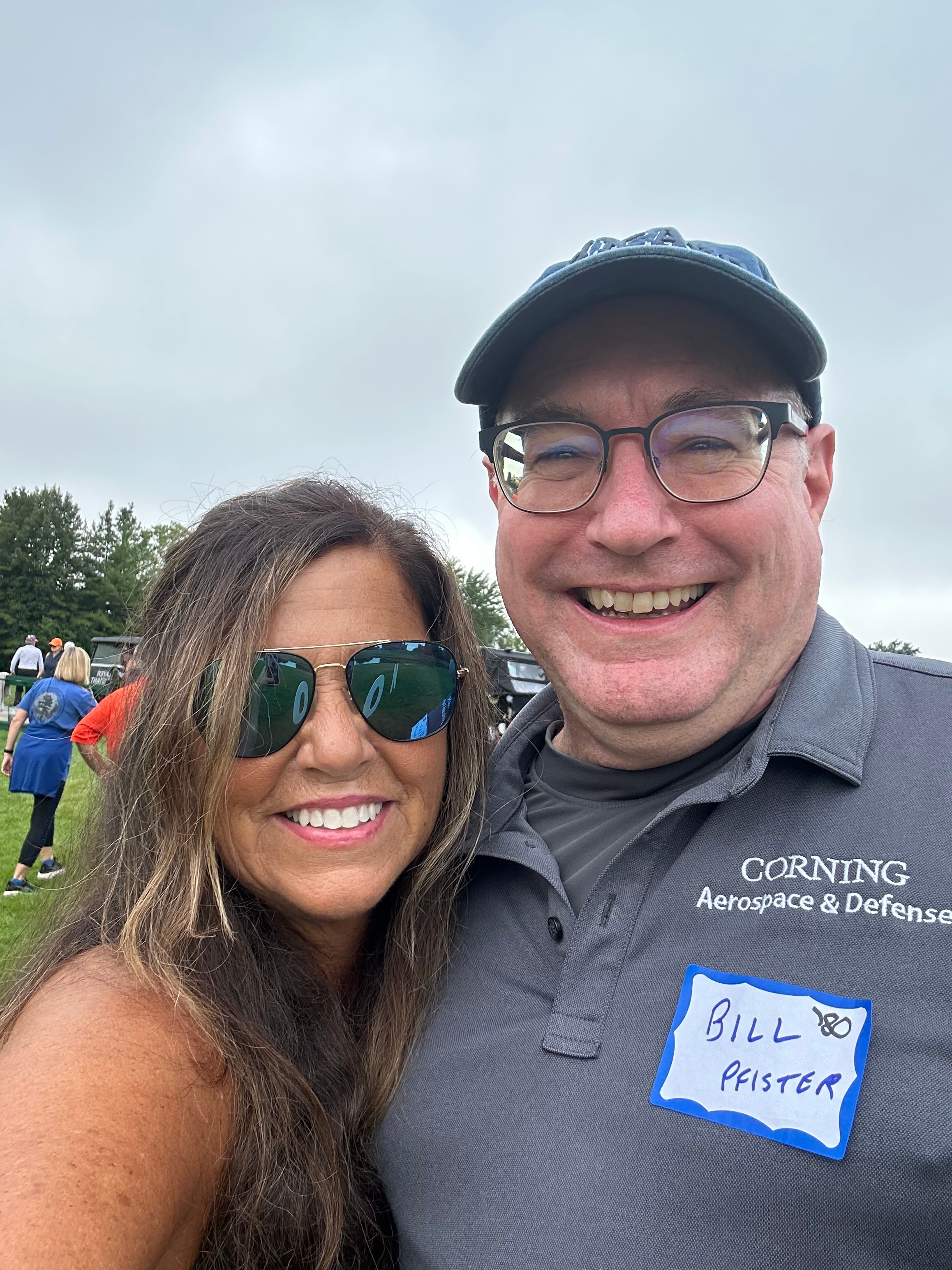 Couple smiling at outdoor event