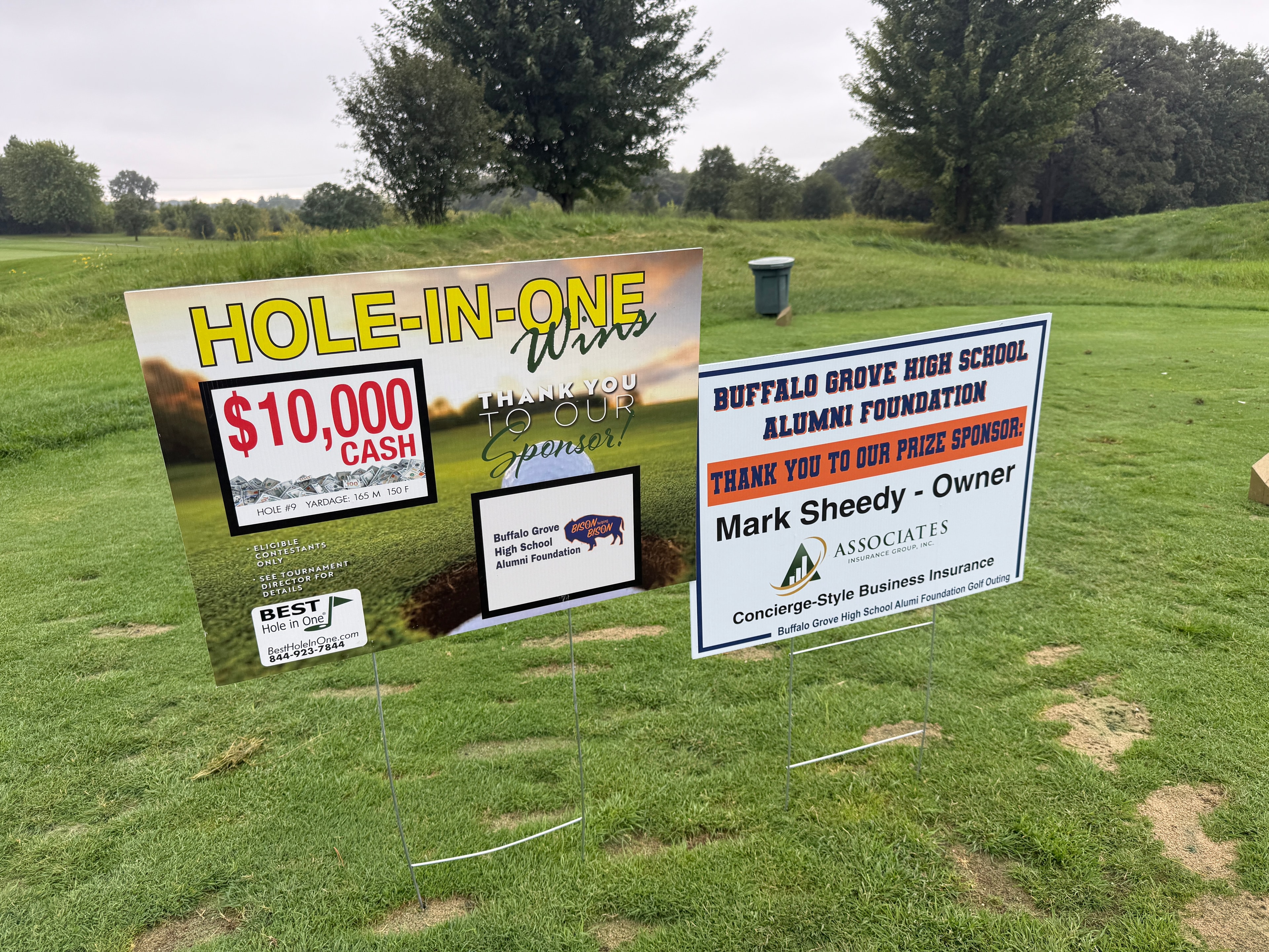 Golf course hole-in-one tournament sponsor signs