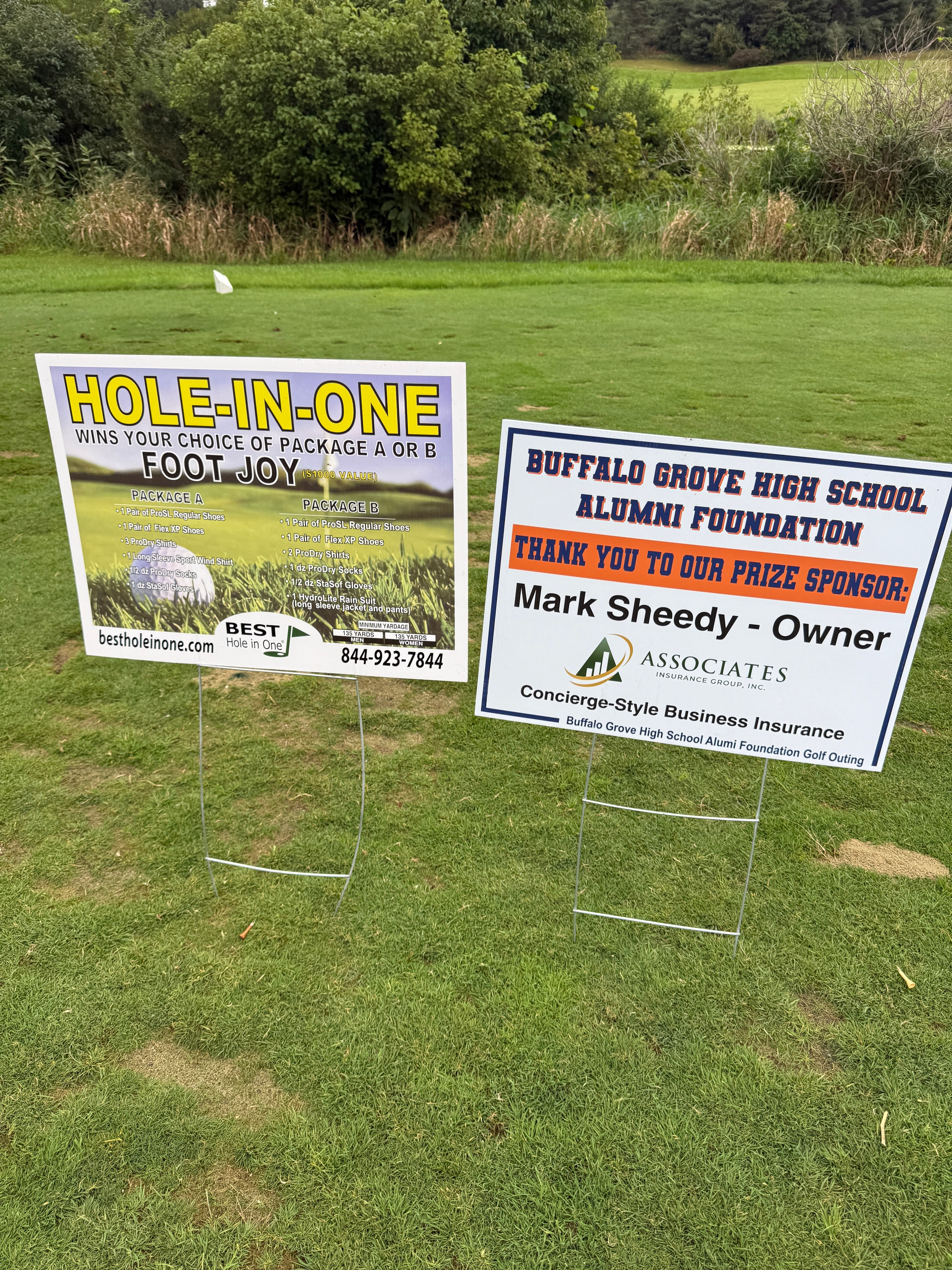Golf course charity event sponsor signs