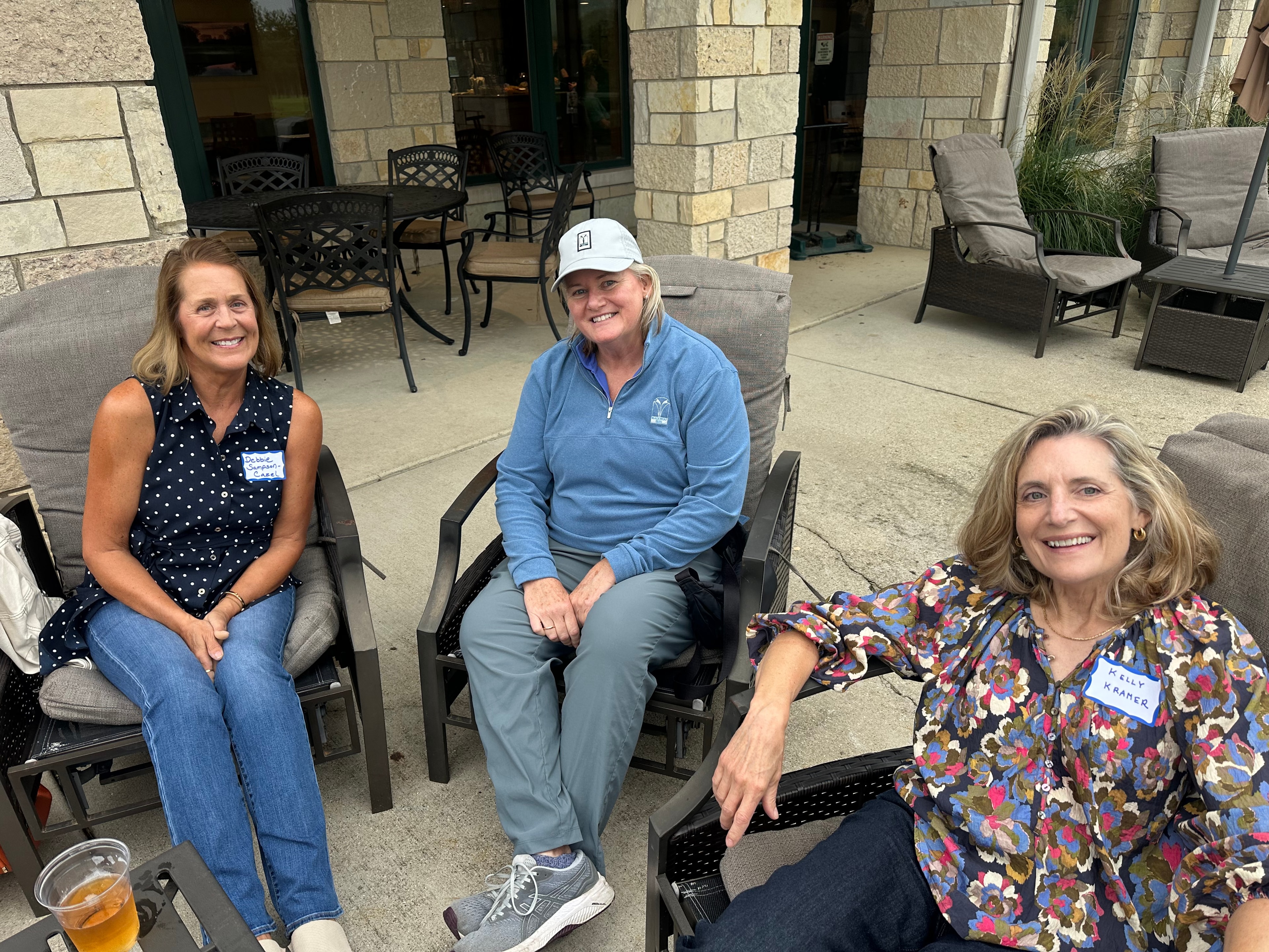 Three women sitting at outdoor patio