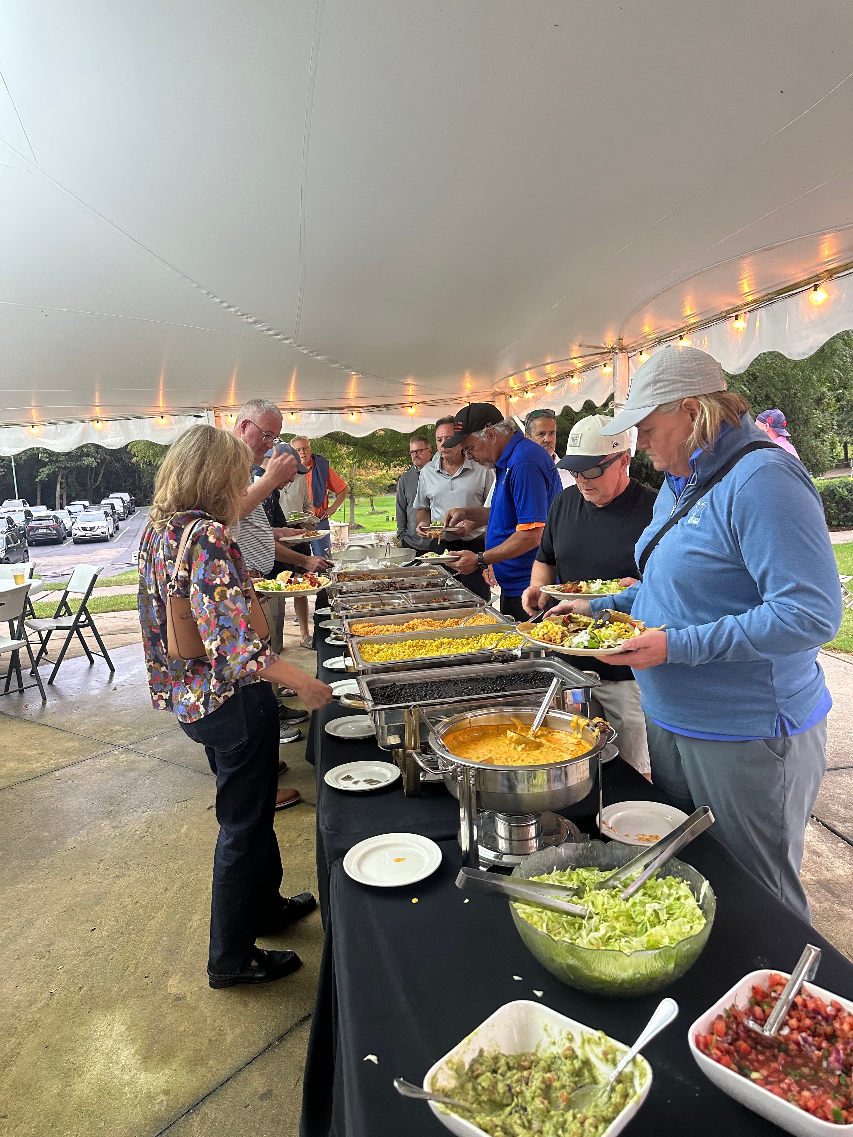 Outdoor catering buffet under tent