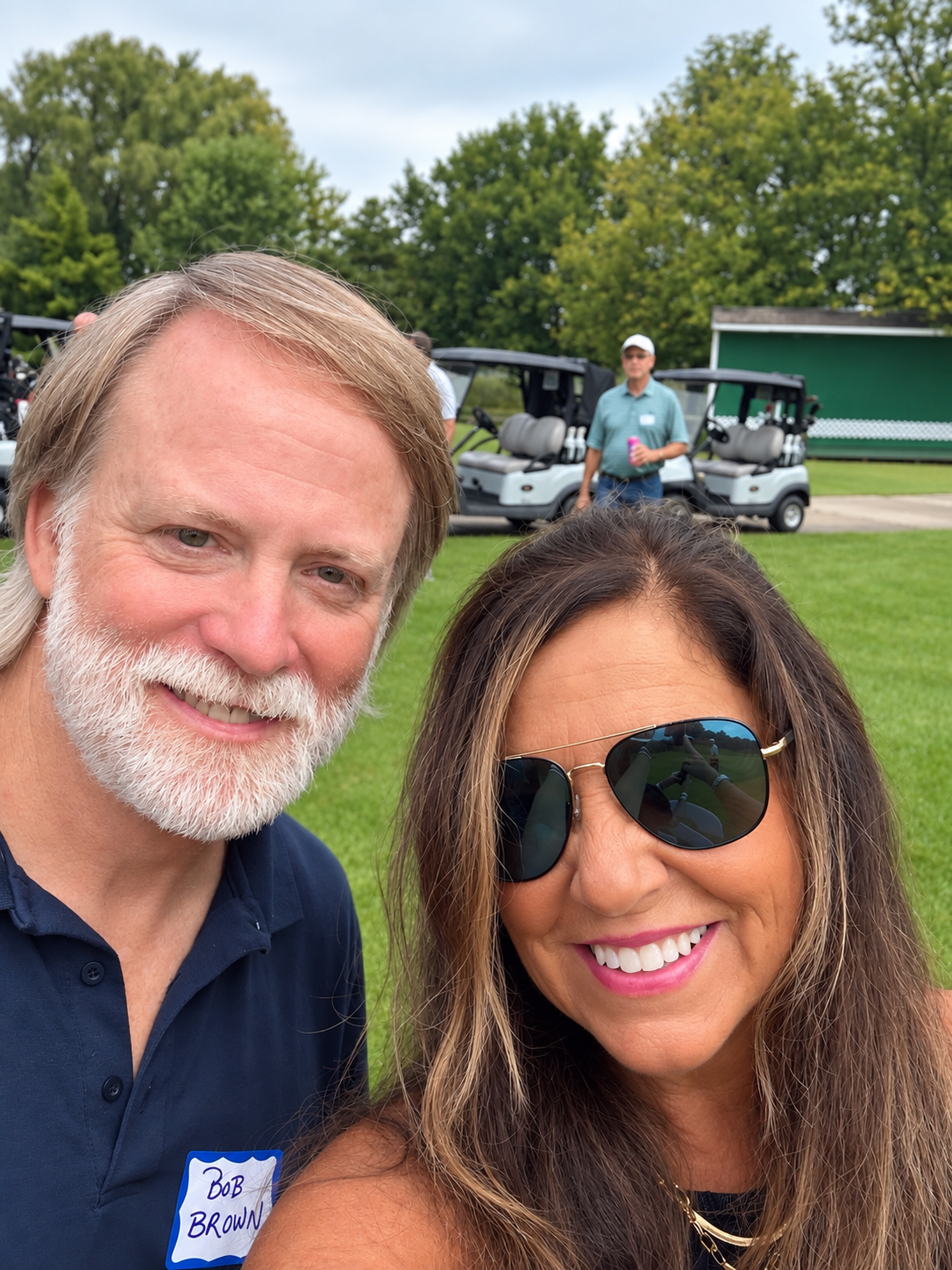 Couple selfie at golf course event